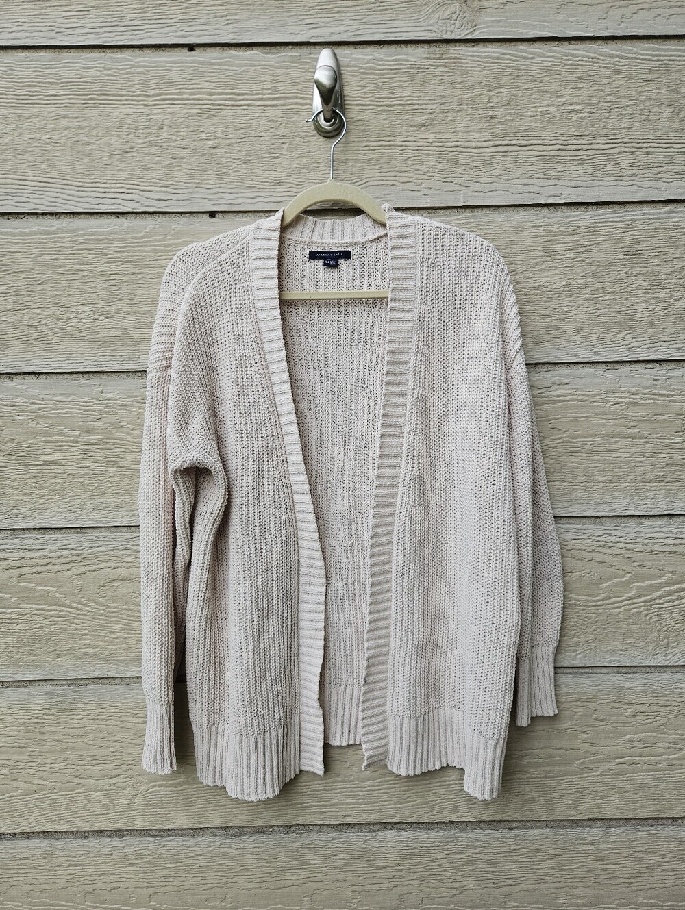 American Eagle cream knit cardigan size small with small flaw